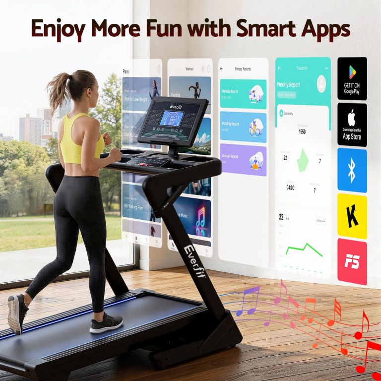 Woman using smart treadmill with fitness app display