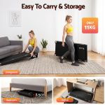 Woman carrying compact treadmill in living room