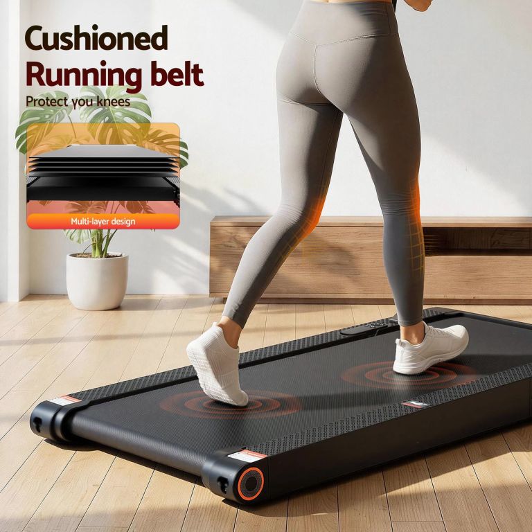 Woman walking on cushioned home treadmill