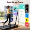 everfit 4 in 1 vibration walking pad treadmill under desk treadmills for home gym with app control 380mm black Woman using smart treadmill with fitness app display