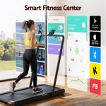 Woman using smart treadmill with fitness app display