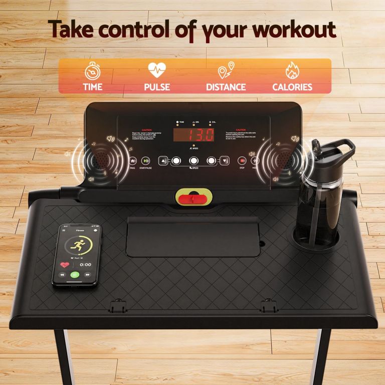 Treadmill console with workout metrics display and speakers