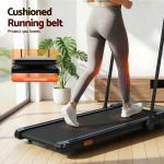 Woman walking on cushioned treadmill at home
