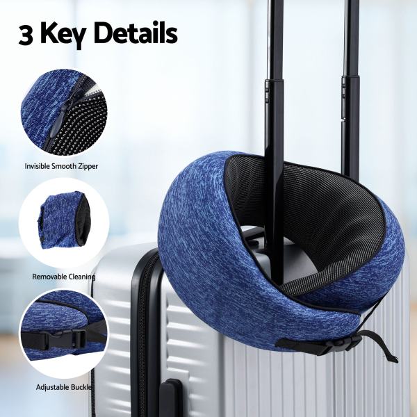 Blue travel neck pillow on suitcase handle