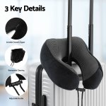 Travel neck pillow attached to suitcase handle