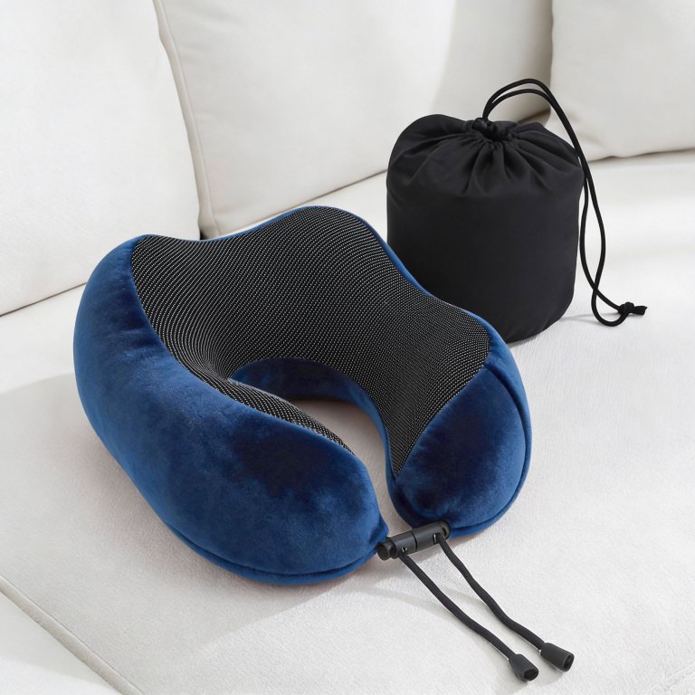Blue travel neck pillow with carry bag