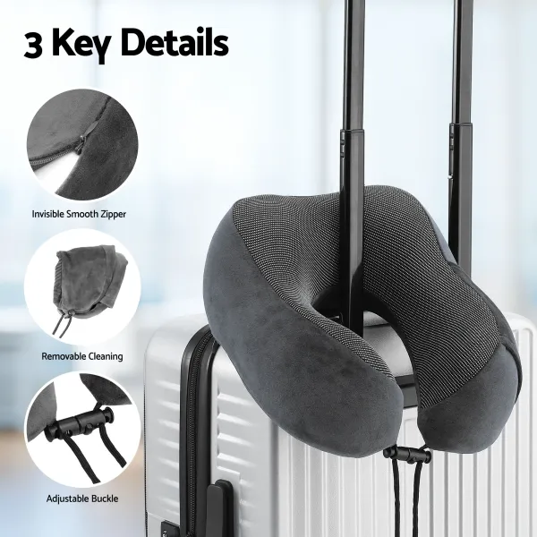 Grey travel neck pillow on suitcase handle