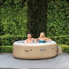 v1032 ixbubblespa 28426 202508200921 00.jpg Couple relaxing in inflatable backyard spa