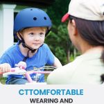 outdoormaster youth & kids bike helmet adjustable multi sports skateboard helmet with removable liners for balance bike, toddler scooter, one wheel hoverboard blue s Child wearing blue helmet on pink bicycle