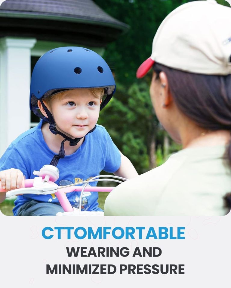 outdoormaster youth & kids bike helmet adjustable multi sports skateboard helmet with removable liners for balance bike, toddler scooter, one wheel hoverboard blue s Child wearing blue helmet on pink bicycle