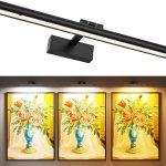 Modern black LED picture light above framed artwork