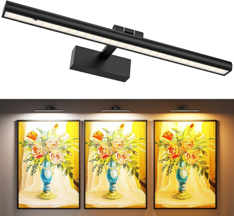 Modern black LED picture light above framed artwork