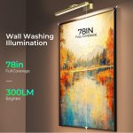 Wall-mounted picture light illuminating large artwork
