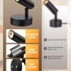 Black adjustable spotlight with sturdy round base