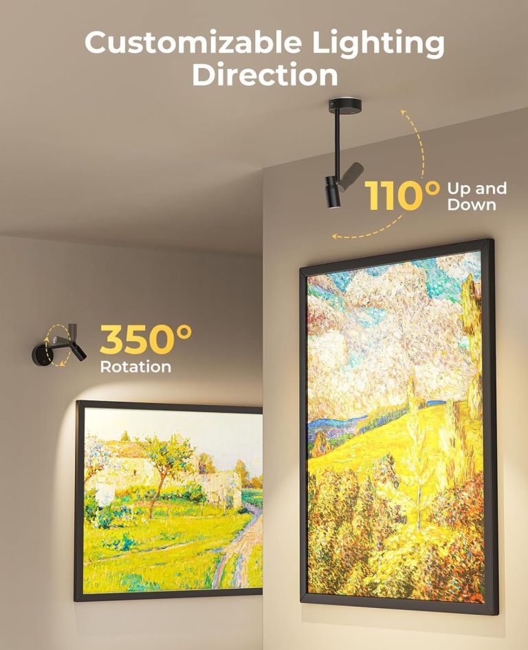 Adjustable spotlight illuminating framed wall artwork