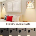 Adjustable wall sconces above modern bedroom bed