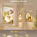 Adjustable wall lights illuminating framed artworks indoors