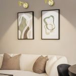 Modern living room with abstract art and sconces