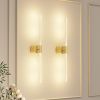 Modern gold wall sconces with vertical LED light bars
