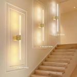 gold battery operated wall sconce set of 2, rechargeable wireless wall lights with remote and touch, 360° rotatable sconces wall decor for bedroom living room (23.62 inch, 2 pack) Modern wall sconces beside wooden staircase