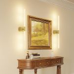 gold battery operated wall sconce set of 2, rechargeable wireless wall lights with remote and touch, 360° rotatable sconces wall decor for bedroom living room (23.62 inch, 2 pack) Framed landscape painting with wall sconces above console