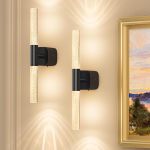 Modern wall sconces beside framed artwork