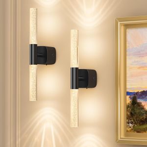 Modern wall sconces beside framed artwork