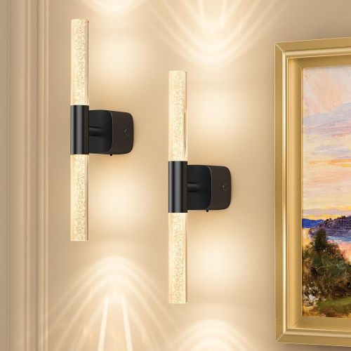 Modern wall sconces beside framed artwork