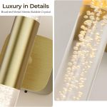 Brushed gold wall light with bubble crystal