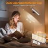 Woman reading under wall-mounted LED light