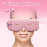 Woman wearing pink Bluetooth eye massager mask