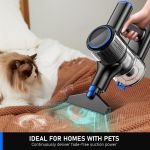 Handheld vacuum cleaning pet hair from blanket