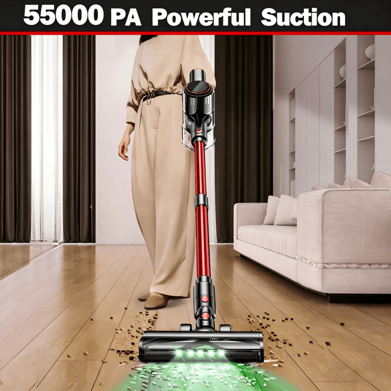 Cordless vacuum cleaning debris on wooden floor