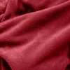 Close-up of soft red plush fabric folds