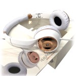 White and rose gold over-ear headphones