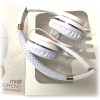 White and rose gold over-ear headphones in box