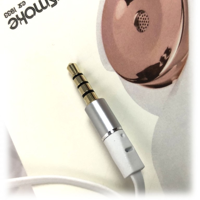 Close-up of 3.5mm audio jack and speaker