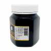 Dark honey jar with white screw lid