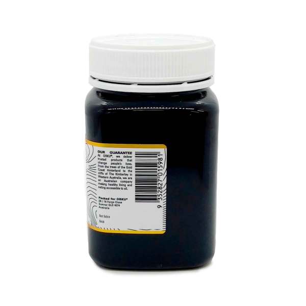 Dark supplement bottle with white screw cap
