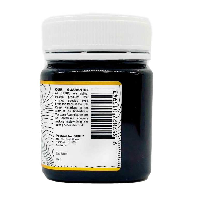 Dark glass jar with white lid and label