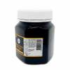 Jar of Manuka honey with white lid