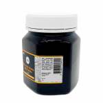 Jar of Manuka honey with white lid