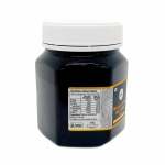 Jar of Australian Manuka honey with white lid