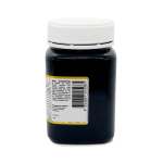 Dark supplement bottle with white screw cap