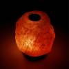 12v 12w 3 5kg himalayan pink salt diffuser essential oil lamp aromatherapy on/off Glowing Himalayan salt lamp against dark background
