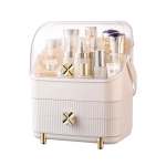 Cream vanity case with skincare and perfume bottles