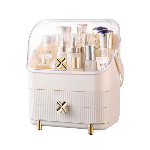 Cream vanity case with skincare and perfume bottles