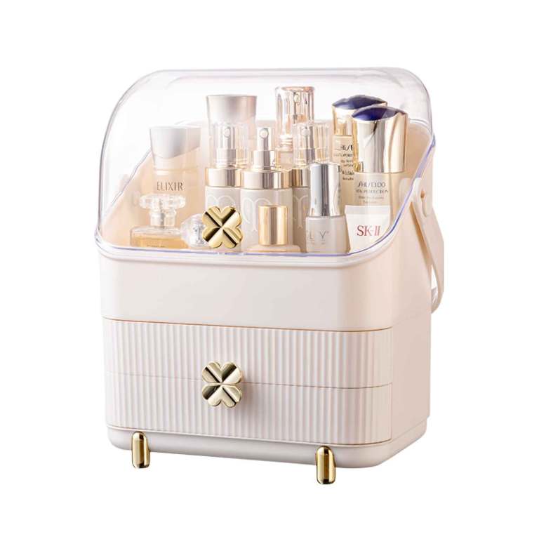 Cream vanity case with skincare and perfume bottles