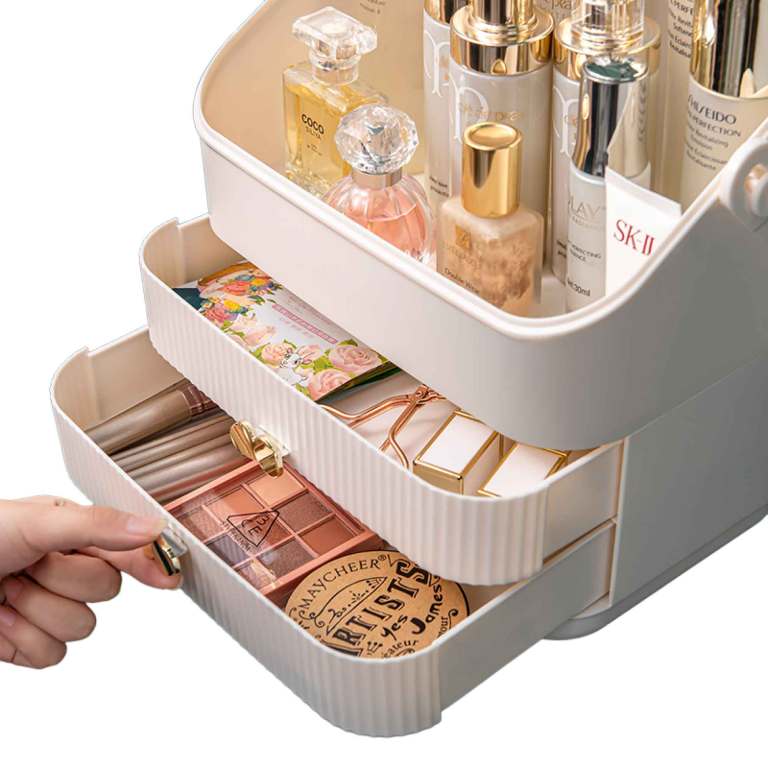 Two-tier makeup organiser with perfumes and drawer