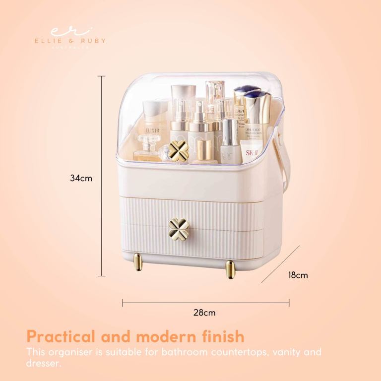Cream cosmetic organiser with clear lid and gold accents